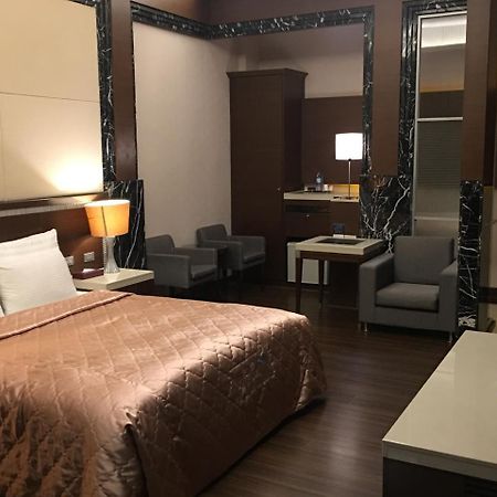 Jing Hwa Motel Tajnan Kültér fotó